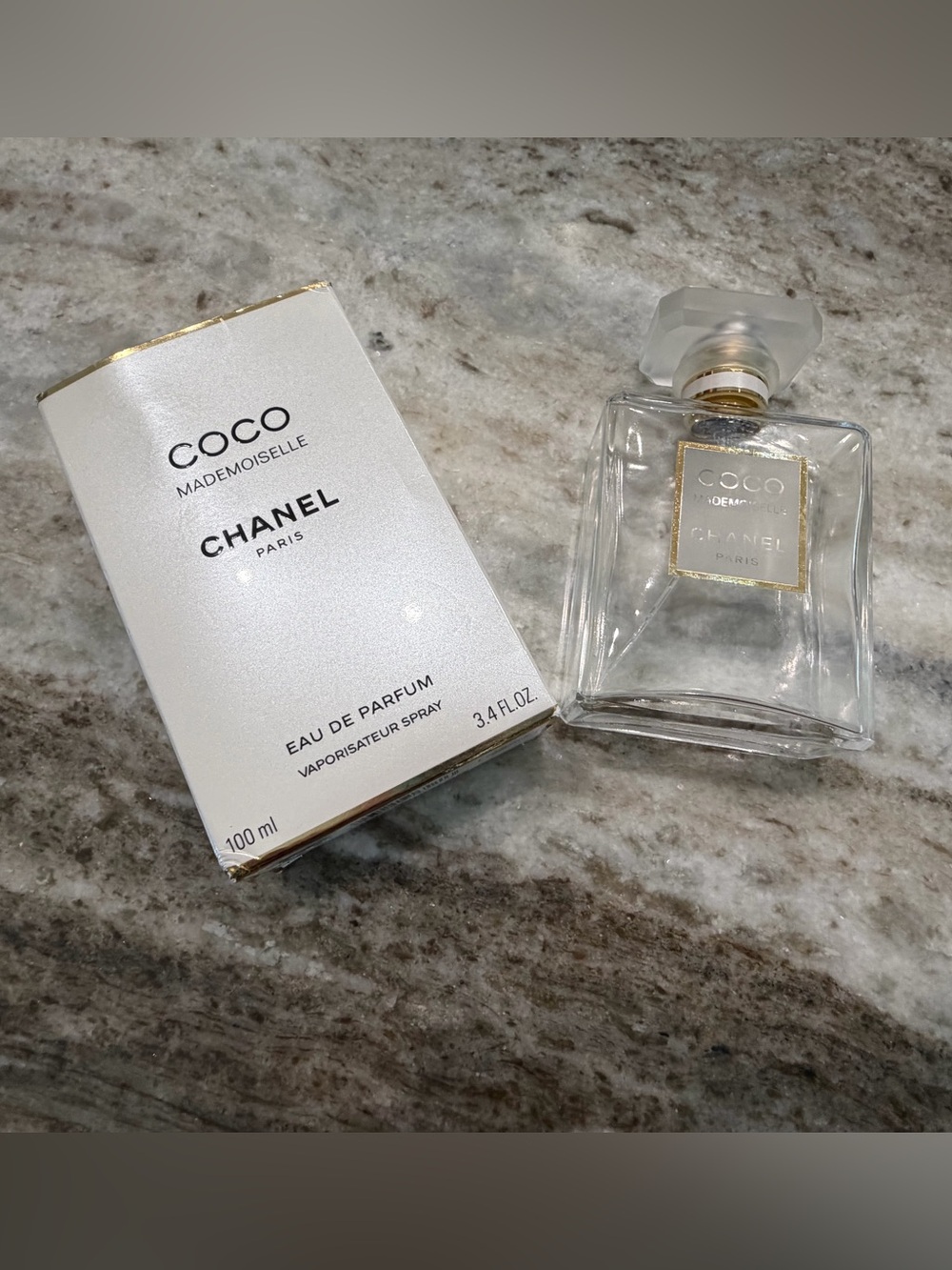 CHANEL Clear Glass Perfume Bottle with Gold Accents